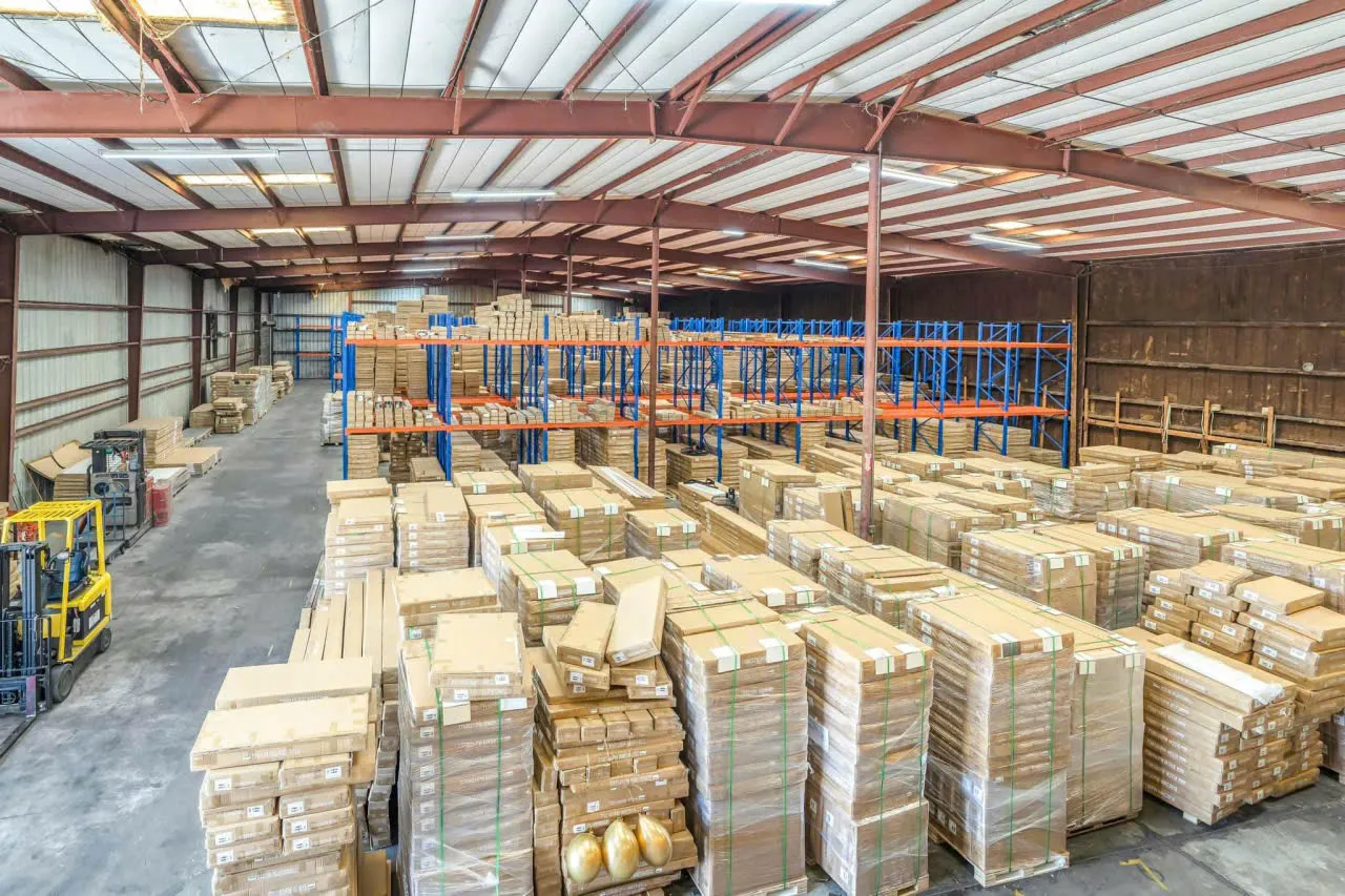 An aisle of racked cabinet cartons in the United States warehouse